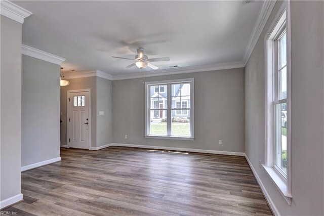 3545 Amberley Way, Williamsburg, VA 23188 - empty room with plenty of natural light, ornamental molding, a ceiling fan, baseboards, and wood finished floors
