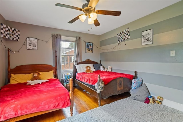 108 Pocahontas St, Franklin, VA 23851 - bedroom with wood finished floors and ceiling fan