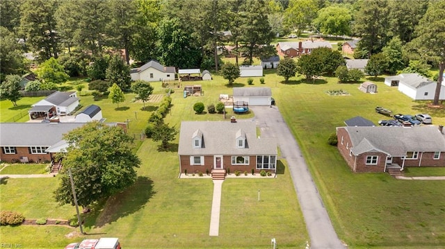 108 Pocahontas St, Franklin, VA 23851 - aerial perspective of suburban area featuring a tree filled landscape