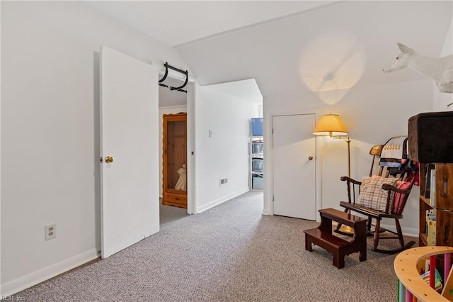 108 Pocahontas St, Franklin, VA 23851 - sitting room with carpet flooring, baseboards, and vaulted ceiling