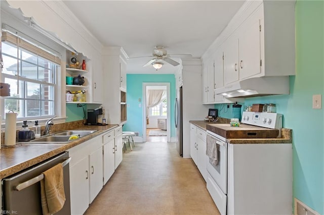 108 Pocahontas St, Franklin, VA 23851 - kitchen featuring appliances with stainless steel finishes, under cabinet range hood, a sink, ceiling fan, and white cabinets
