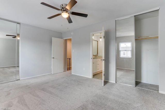 722 White Hall Ln, Virginia Beach, VA 23464 - unfurnished bedroom with light colored carpet, a sink, and baseboards