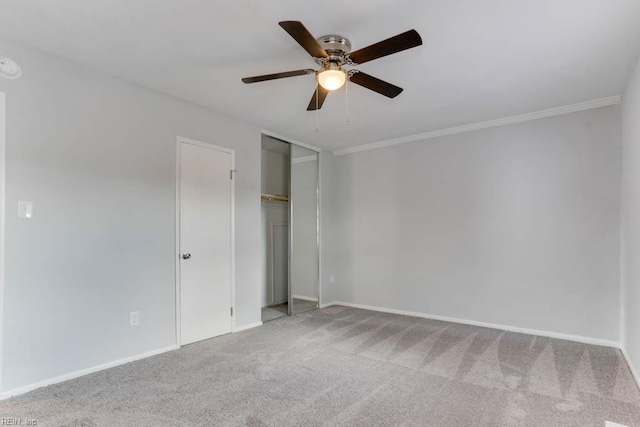 722 White Hall Ln, Virginia Beach, VA 23464 - unfurnished bedroom featuring carpet, ornamental molding, baseboards, a closet, and a ceiling fan