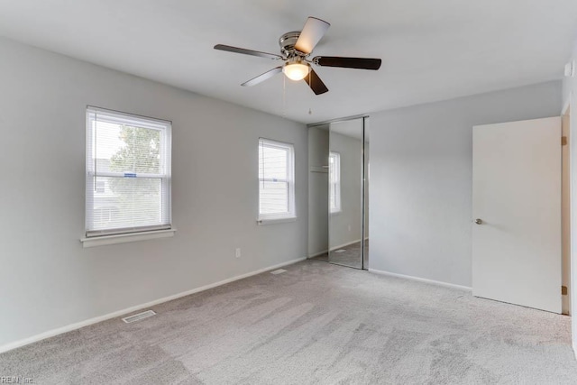 722 White Hall Ln, Virginia Beach, VA 23464 - unfurnished bedroom featuring carpet, a closet, baseboards, and a ceiling fan