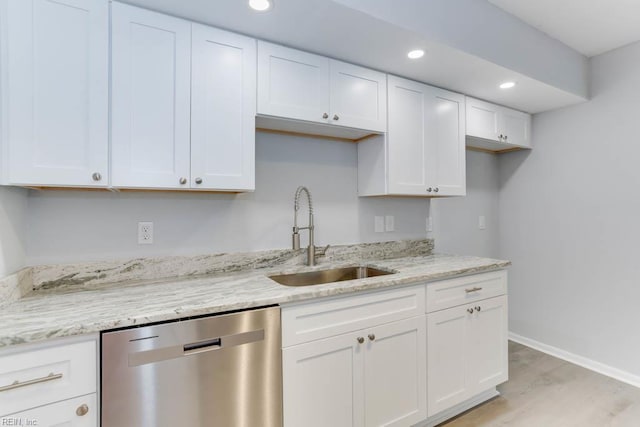 722 White Hall Ln, Virginia Beach, VA 23464 - kitchen with dishwasher, a sink, white cabinetry, baseboards, and light wood-type flooring