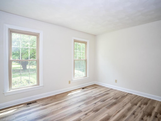 3124 Douglas Rd, Chesapeake, VA 23322 - empty room with light wood-style floors and baseboards