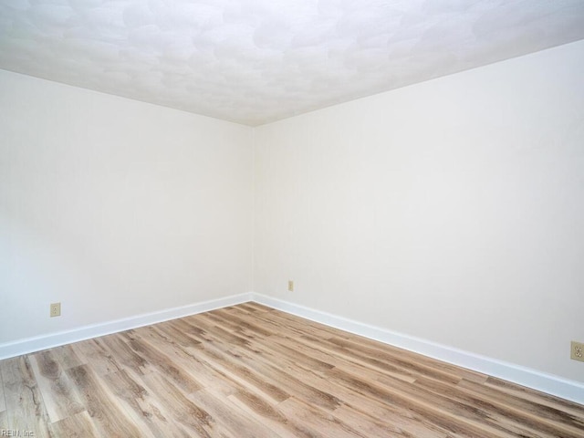 3124 Douglas Rd, Chesapeake, VA 23322 - spare room with light wood-style floors and baseboards