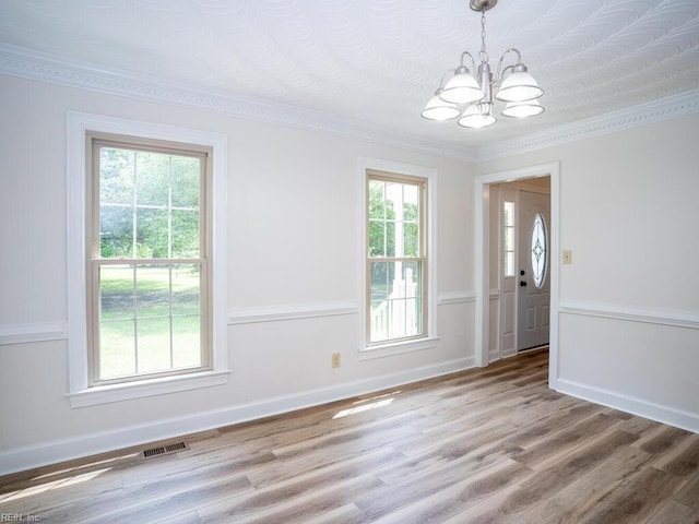 3124 Douglas Rd, Chesapeake, VA 23322 - entrance foyer featuring a chandelier, light wood-style floors, and ornamental molding