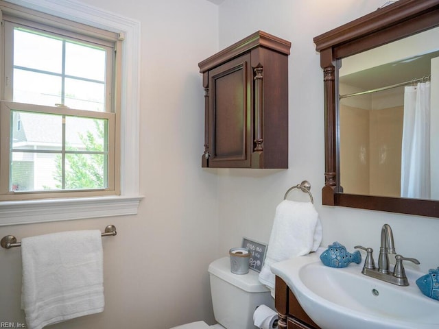 3124 Douglas Rd, Chesapeake, VA 23322 - bathroom featuring toilet, healthy amount of natural light, vanity, and a shower with shower curtain