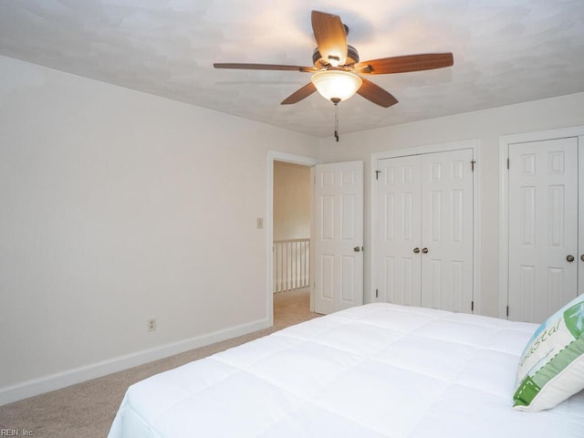 3124 Douglas Rd, Chesapeake, VA 23322 - carpeted bedroom featuring baseboards, two closets, and ceiling fan