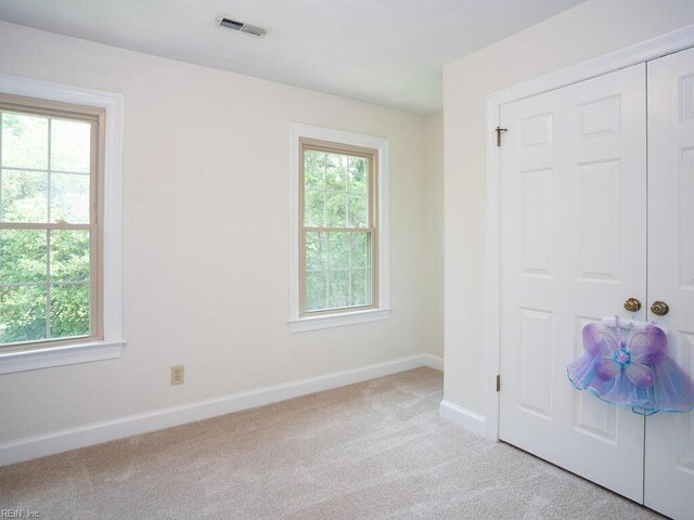 3124 Douglas Rd, Chesapeake, VA 23322 - unfurnished room featuring baseboards and light colored carpet