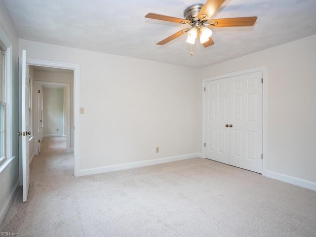 3124 Douglas Rd, Chesapeake, VA 23322 - unfurnished bedroom featuring light colored carpet, a closet, baseboards, and a ceiling fan