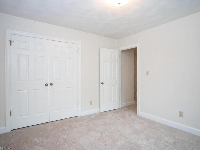 3124 Douglas Rd, Chesapeake, VA 23322 - unfurnished bedroom with a closet, carpet floors, and baseboards