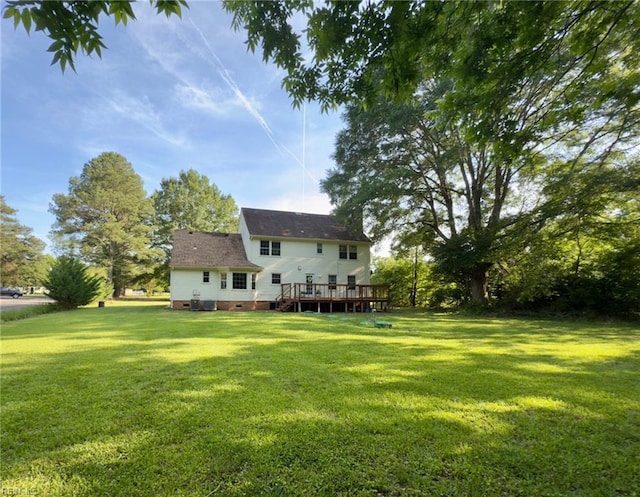 3124 Douglas Rd, Chesapeake, VA 23322 - rear view of house with a deck, crawl space, and a lawn