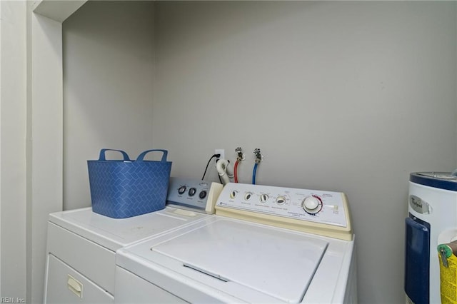 4 Hopkins St, Hampton, VA 23663 - washroom with water heater and washer and clothes dryer