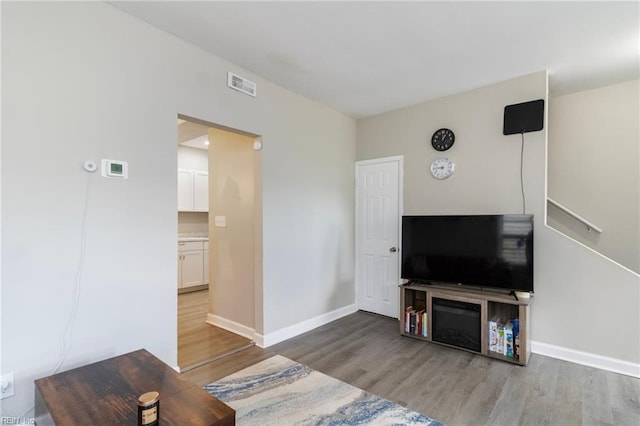 4 Hopkins St, Hampton, VA 23663 - living room featuring wood finished floors and baseboards