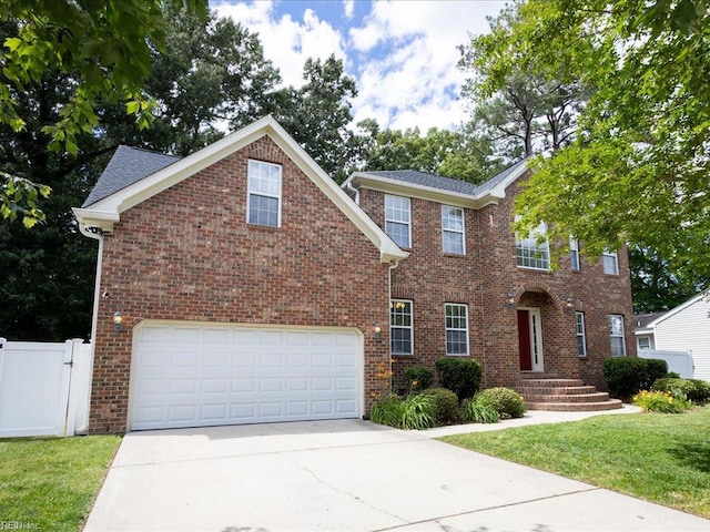 4604 Bellamy Ct, Virginia Beach, VA 23462 - view of front facade featuring concrete driveway, brick siding, and an attached garage