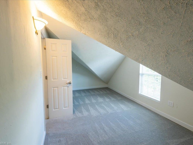 4604 Bellamy Ct, Virginia Beach, VA 23462 - bonus room featuring carpet floors, vaulted ceiling, and baseboards