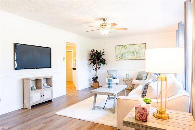 4505 Hessian Ct, Virginia Beach, VA 23462 - living area with wood finished floors, a ceiling fan, ornamental molding, baseboards, and a textured ceiling