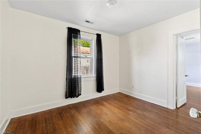 858 47th St, Norfolk, VA 23508 - spare room featuring wood-type flooring and baseboards