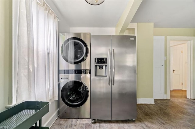 858 47th St, Norfolk, VA 23508 - laundry room featuring estacked washer and dryer, baseboards, and wood finished floors