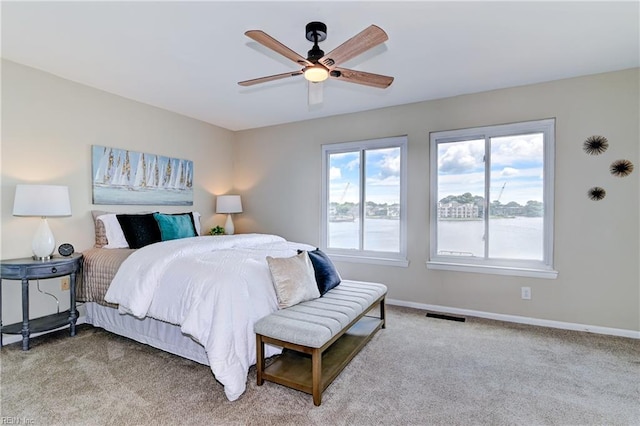 166 Mill Point Dr, Hampton, VA 23669 - bedroom featuring light carpet, baseboards, and a ceiling fan