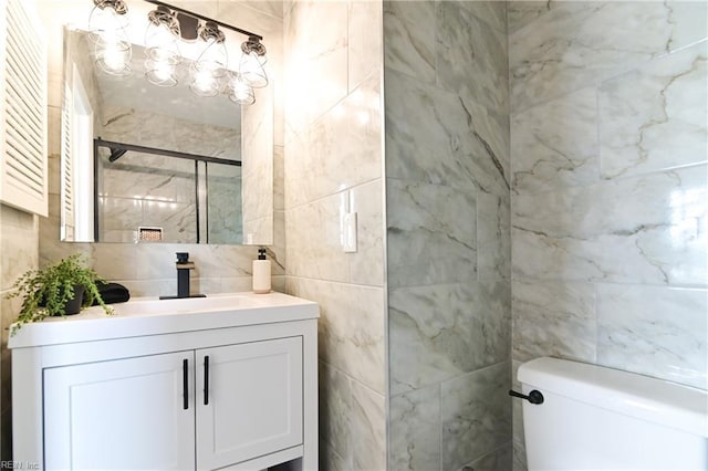166 Mill Point Dr, Hampton, VA 23669 - full bathroom with tile walls, vanity, toilet, and a shower with shower door
