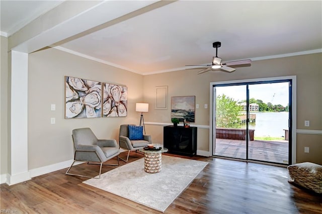 166 Mill Point Dr, Hampton, VA 23669 - living area featuring wood finished floors, a ceiling fan, crown molding, and baseboards