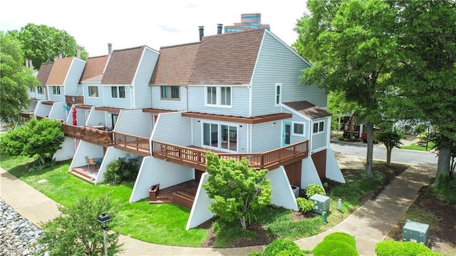 166 Mill Point Dr, Hampton, VA 23669 - rear view of property with a deck, a chimney, and roof with shingles