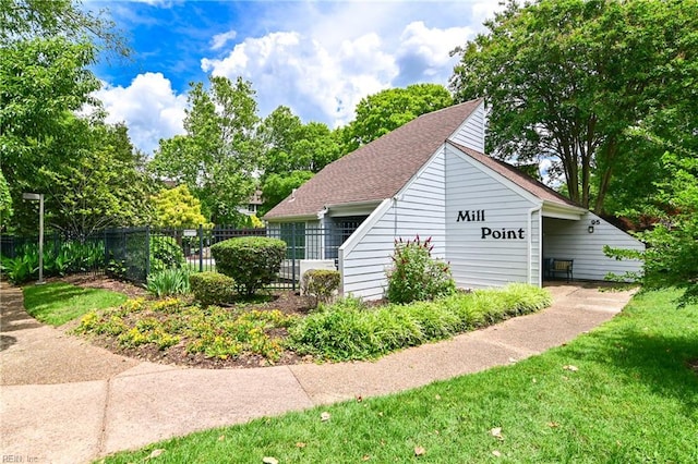 166 Mill Point Dr, Hampton, VA 23669 - view of side of property with a shingled roof