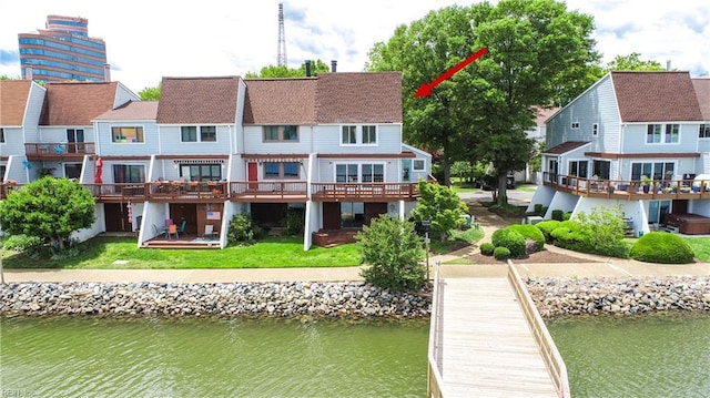 166 Mill Point Dr, Hampton, VA 23669 - back of property with a deck with water view and a yard