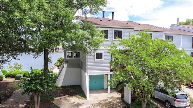 166 Mill Point Dr, Hampton, VA 23669 - back of house with an attached garage