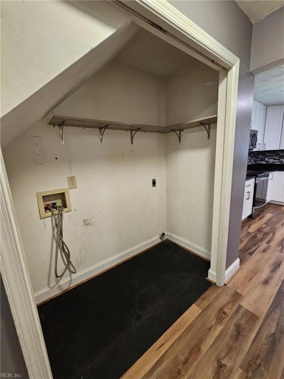 834 Haskins Dr, Suffolk, VA 23434 - washroom featuring dark wood-style floors, washer hookup, baseboards, and hookup for an electric dryer