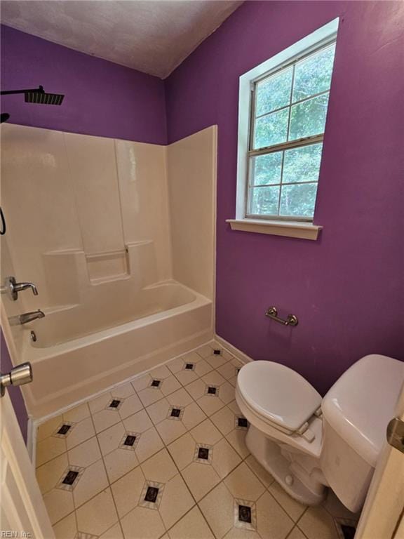 834 Haskins Dr, Suffolk, VA 23434 - bathroom with tile patterned floors, toilet, bathing tub / shower combination, and baseboards