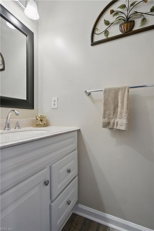 1765 Unicorn Dr, Virginia Beach, VA 23454 - bathroom with vanity, wood finished floors, and baseboards