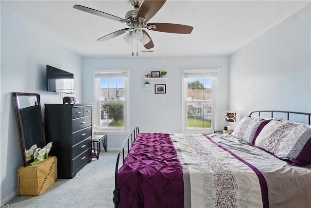 1765 Unicorn Dr, Virginia Beach, VA 23454 - carpeted bedroom featuring multiple windows, baseboards, and a ceiling fan