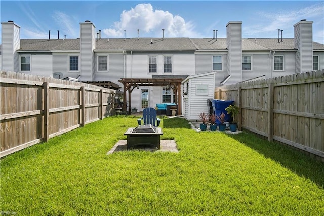 1765 Unicorn Dr, Virginia Beach, VA 23454 - back of property with a fire pit and a pergola