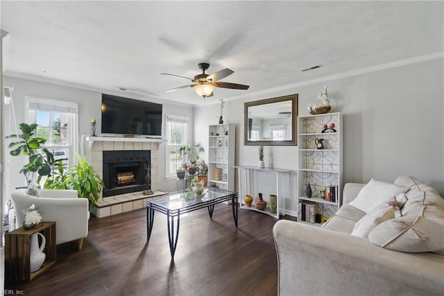1765 Unicorn Dr, Virginia Beach, VA 23454 - living area with a ceiling fan, crown molding, dark wood finished floors, and a tiled fireplace
