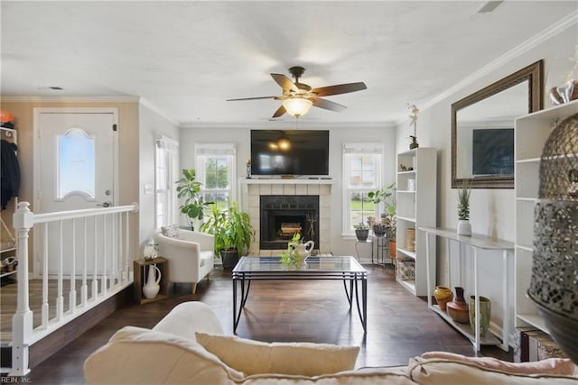 1765 Unicorn Dr, Virginia Beach, VA 23454 - living area featuring a tiled fireplace, a ceiling fan, wood finished floors, and crown molding