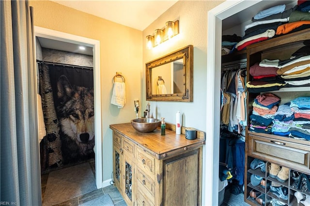 14387 Tucker Swamp Rd, Zuni, VA 23898 - full bath featuring vanity and a spacious closet