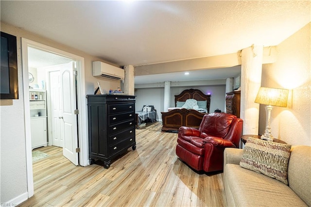 14387 Tucker Swamp Rd, Zuni, VA 23898 - living room with a wall mounted AC and light wood-type flooring