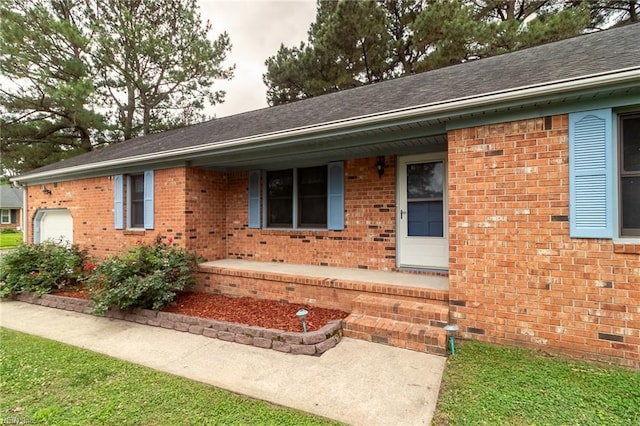 1238 Grenadier Dr, Chesapeake, VA 23322 - ranch-style home featuring a garage, brick siding, and a shingled roof