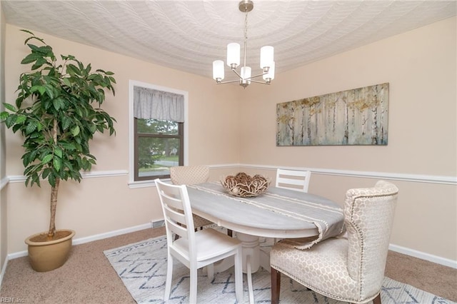 1238 Grenadier Dr, Chesapeake, VA 23322 - carpeted dining room featuring a chandelier and baseboards