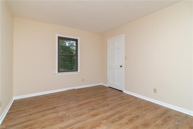 1238 Grenadier Dr, Chesapeake, VA 23322 - unfurnished room with wood finished floors and baseboards