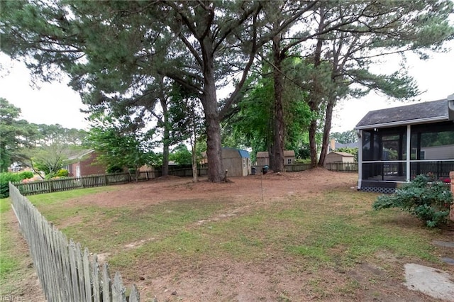 1238 Grenadier Dr, Chesapeake, VA 23322 - fenced backyard with a sunroom