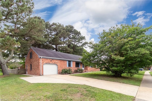 1238 Grenadier Dr, Chesapeake, VA 23322 - view of front of house with an attached garage, brick siding, and concrete driveway