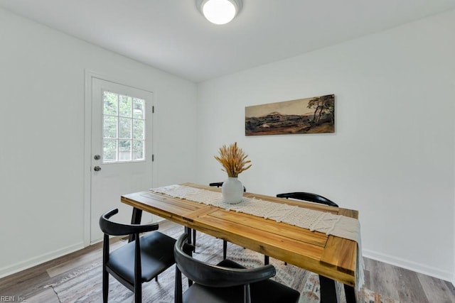 4401 Southampton Arch, Portsmouth, VA 23703 - dining space featuring baseboards, a desk, and wood finished floors