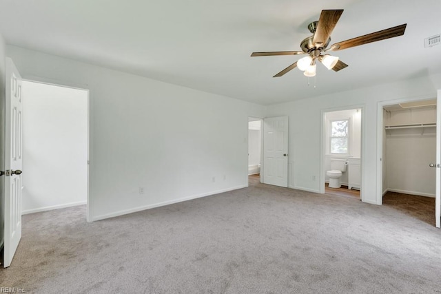 4401 Southampton Arch, Portsmouth, VA 23703 - unfurnished bedroom with a spacious closet, carpet, a closet, and baseboards