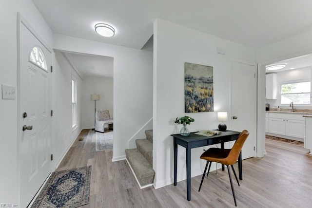 4401 Southampton Arch, Portsmouth, VA 23703 - entrance foyer with light wood-style flooring, stairway, and baseboards