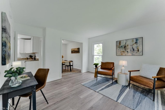 4401 Southampton Arch, Portsmouth, VA 23703 - sitting room featuring light wood-type flooring and baseboards